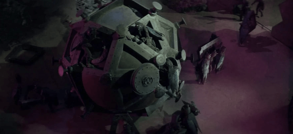 Worker selenites (kids in costumes) dismantle the sphere