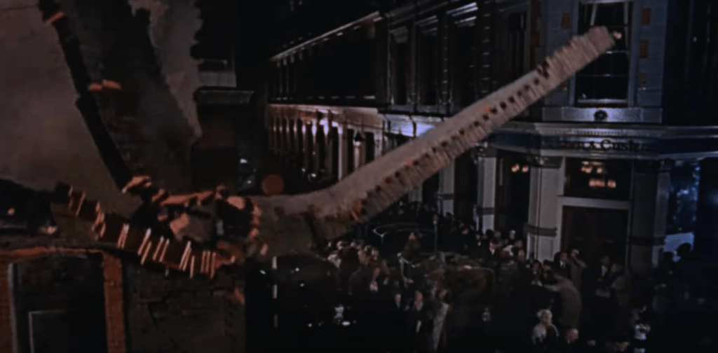 A wall topples towards panic-stricken Londoners 