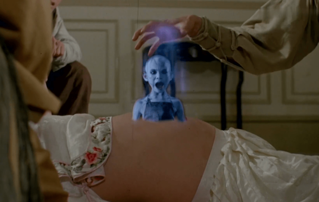 Lam uses his powers to draw the evil child-spirit from his former lover's belly