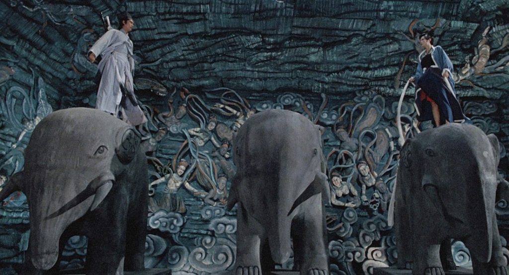 Getting ready to fight on the elephant statues...