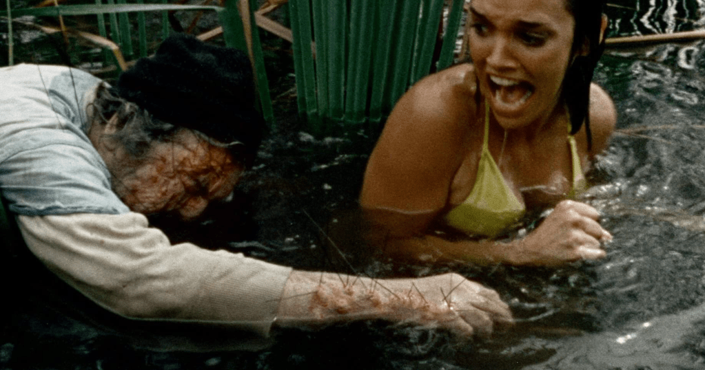 Rose (Brooke Adams) encounters the cook's corpse, which is covered in sea urchin spines