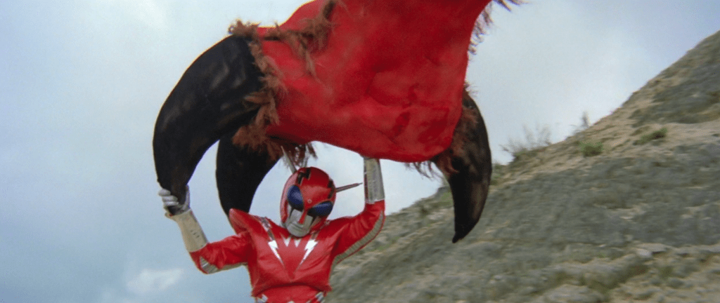 ...and the gigantic bug-dude tries to squish Inframan...