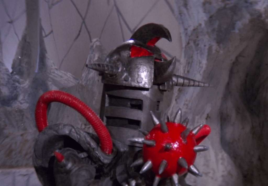 These metal dudes each have a red-painted mace-hand