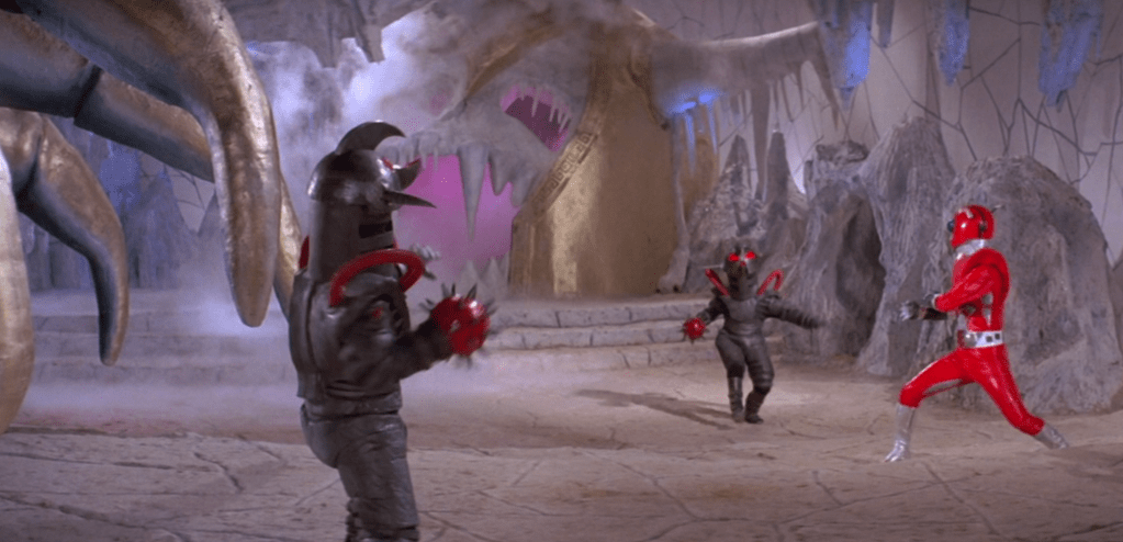 Inframan squares off against the two mechanical men!