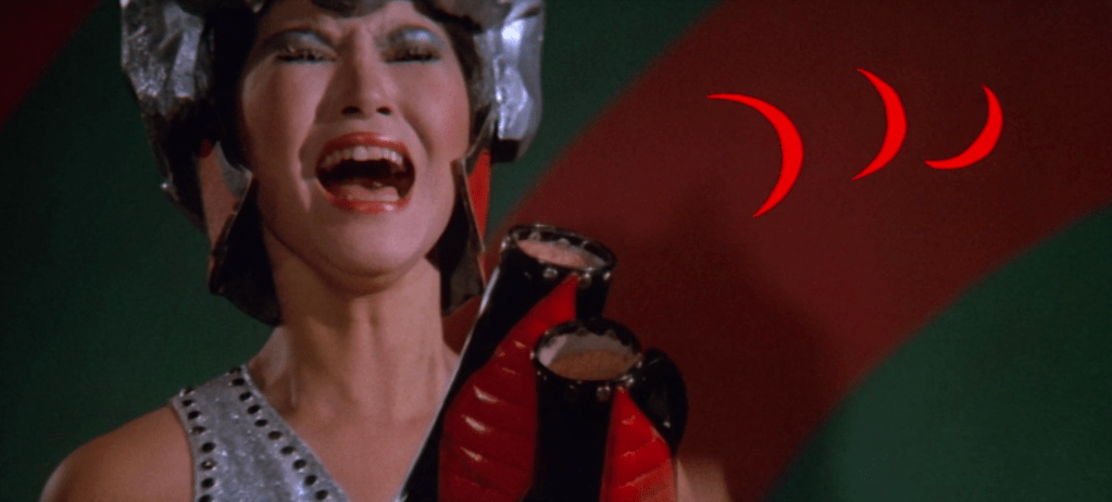 ...but she gets her hands cut off by Inframan's crescent-shaped laser blade beams...