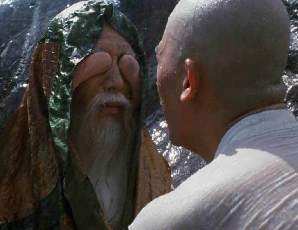 The Buddhist master extends his earlobes so that they can cover his eyes!