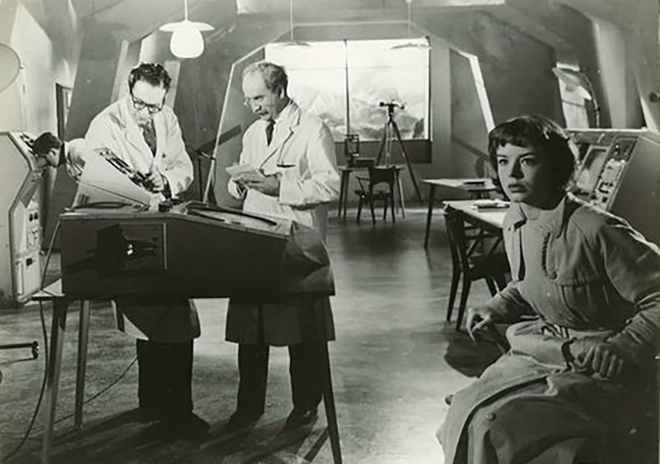 Anne, looking concerned, sits in the mountain observatory