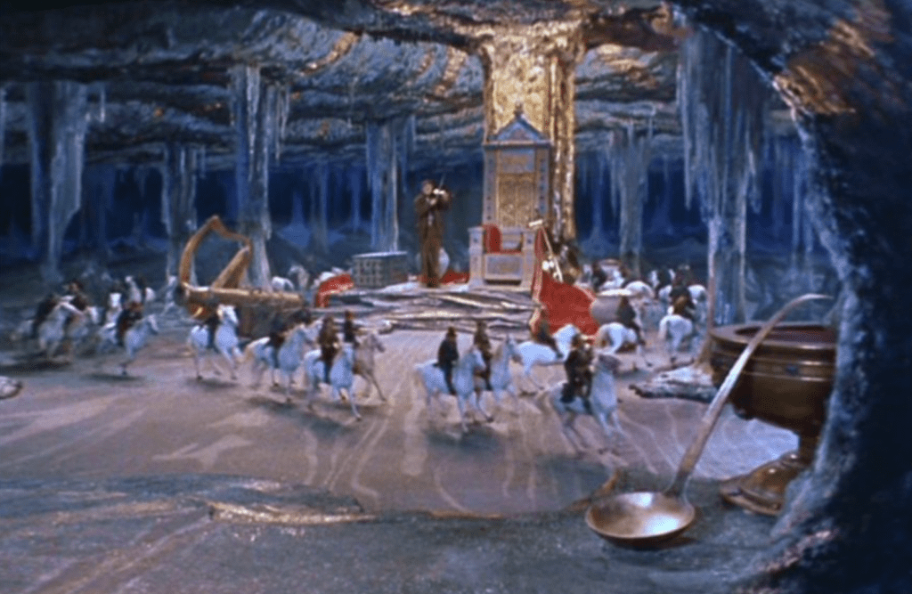 At one point the little people ride little horses!