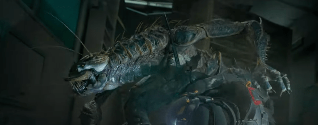 Tyler tussles with one of the alien critters!