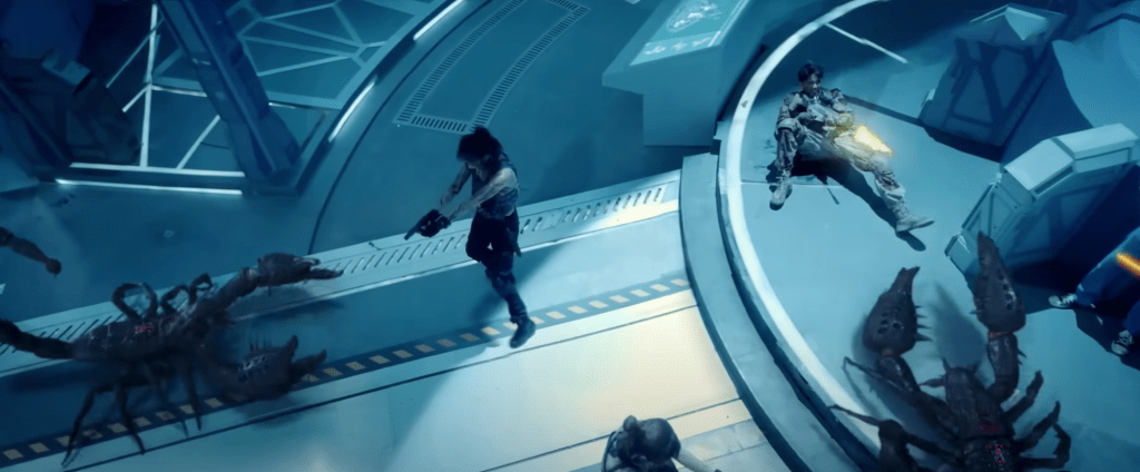 A gal and a guy unleash some lead into the big bugs