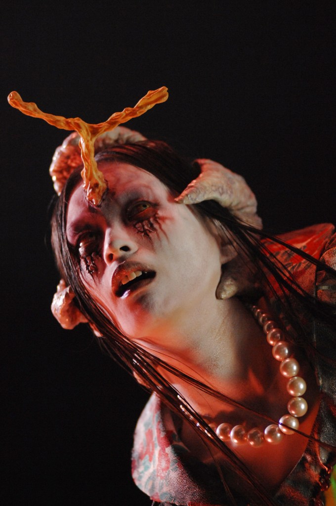 Rikka has a starfish-shaped alien attached to the back of her head!