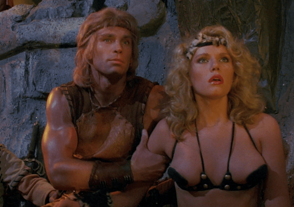 Kaira (Lana Clarkson) doesn't wear an awful lot in this movie...