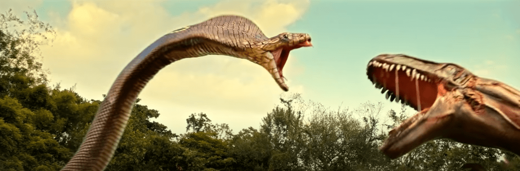 The big cobra and the huge carnosaur roar at each other!