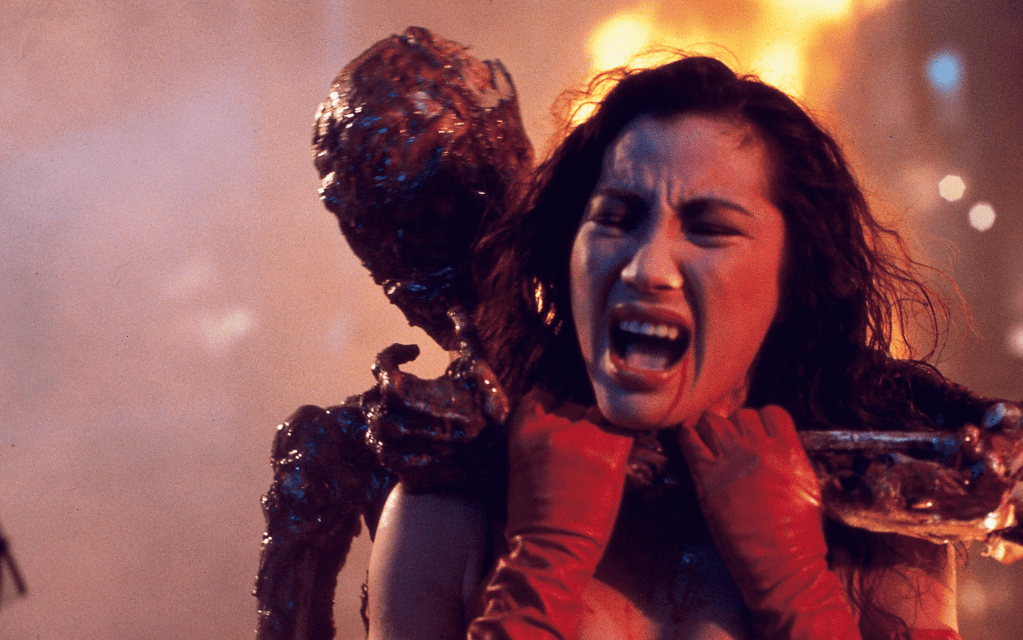 Invisible Woman (Michelle Yeoh) gets grabbed!