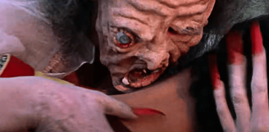 ...who sinks her fangs into the poor knight's neck!