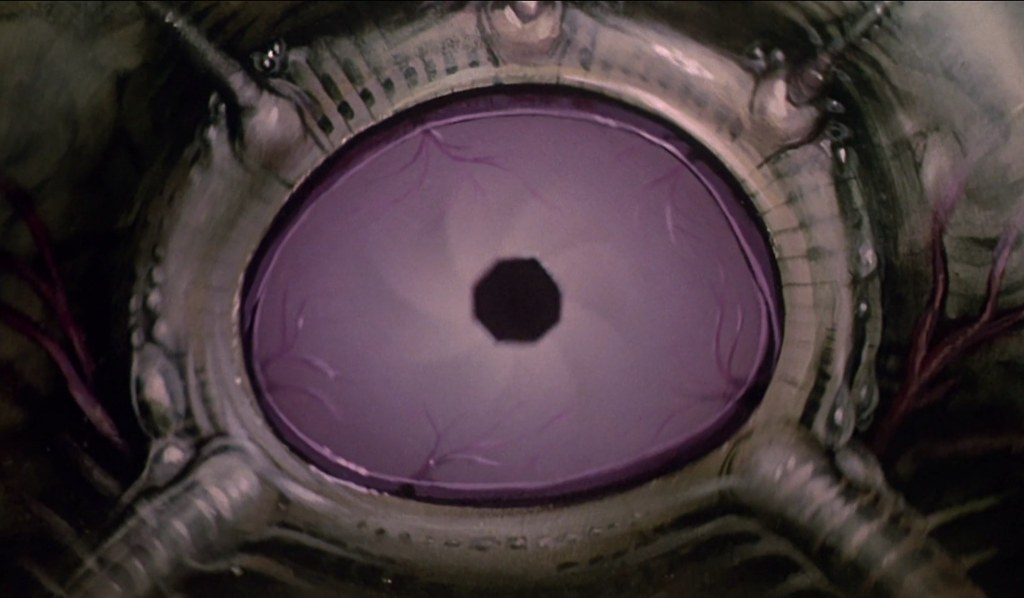 Above: two shots of the lake octopus-monster's purple-coloured eye!