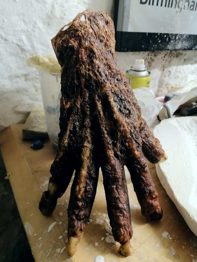 This very effective-looking zombie hand was created by gluing the latex moulding onto a glove!