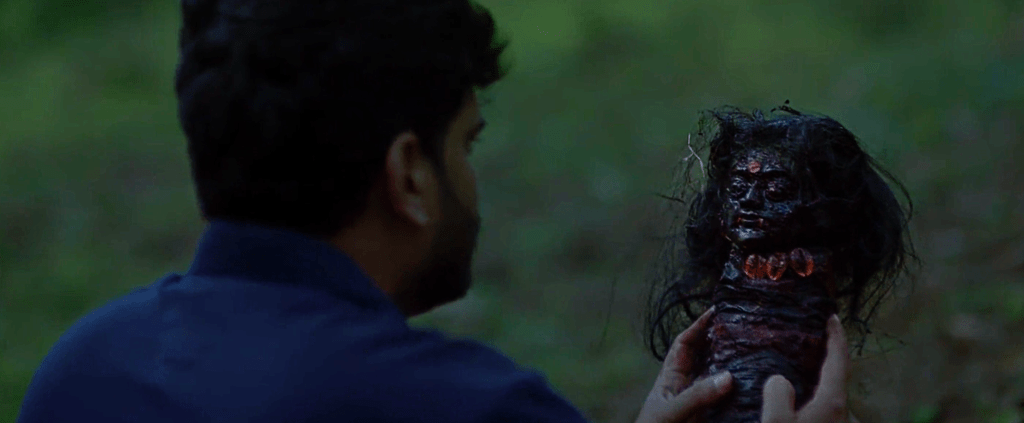 Above: two shots of the weird wooden doll (that was used to house the spirit of Pechi)