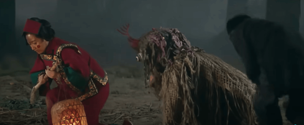 Above: two shots showing the local folks taking part in their Lord Water Monkey ceremony