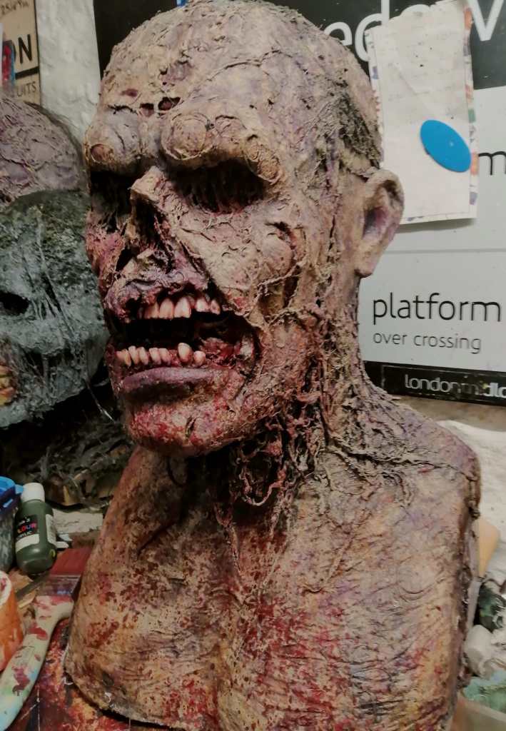 A retro, practical-effects zombie! Woot!