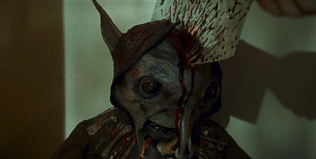 A Redcap is hacked in the head with a cleaver!