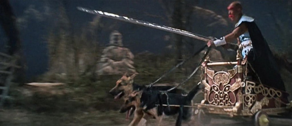 Red Haired Evil, riding his chariot pulled by dogs!