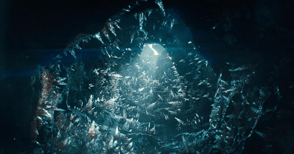 A vertical cave shaft that is lined with sharp crystals