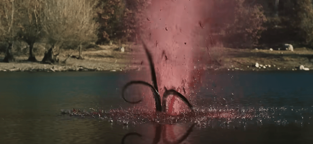 Tentacles erupt from the water!