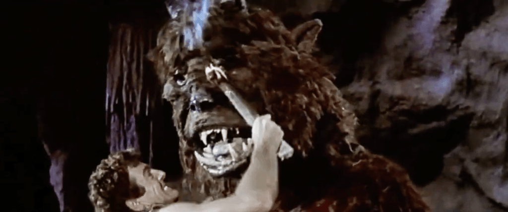 Theseus burns out the Minotaur's left eye...