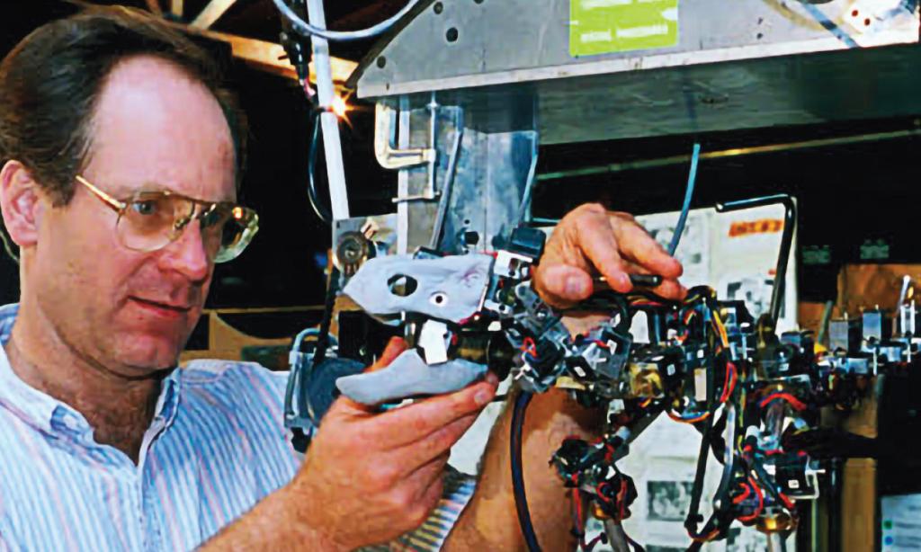 Randal Dutra working on a Dinosaur Input Device