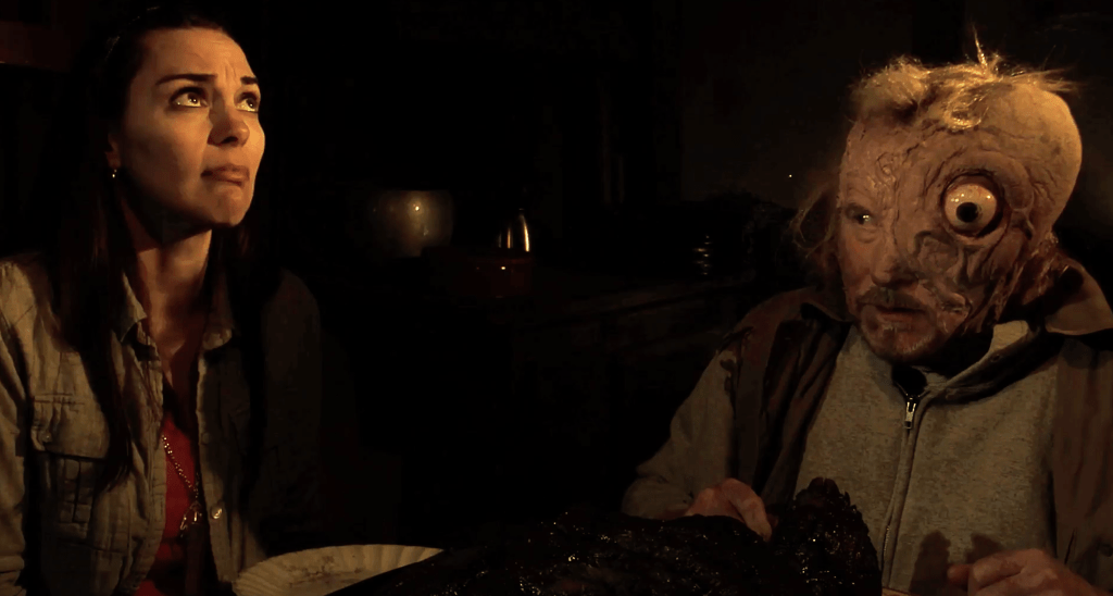 Claire (Natalie Himmelberger) doesn't enjoy sharing the dinner table with Bart (Ken Van Sant)