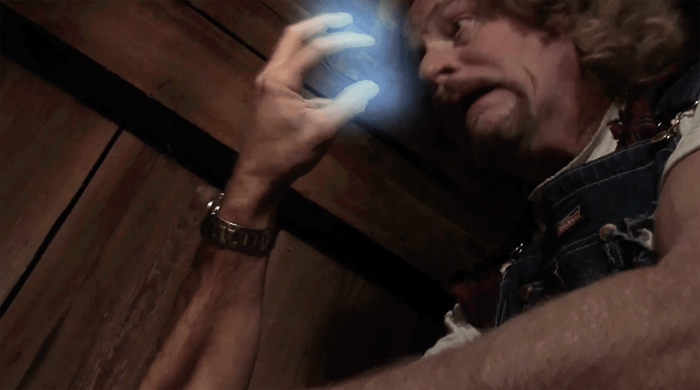 Lee uses his new alien powers to thwart the redneck attack
